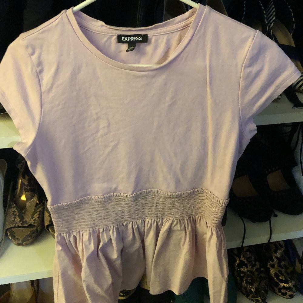 Express, short sleeve Lilac peplum top.